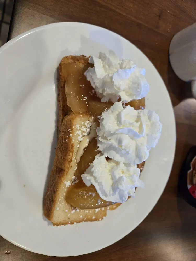 French Toast with Glazed Apples and Whipped Cream